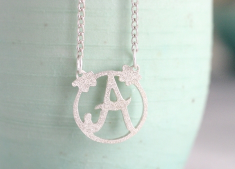 small decorated initial necklace